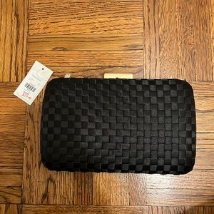 Francesca’s black clutch